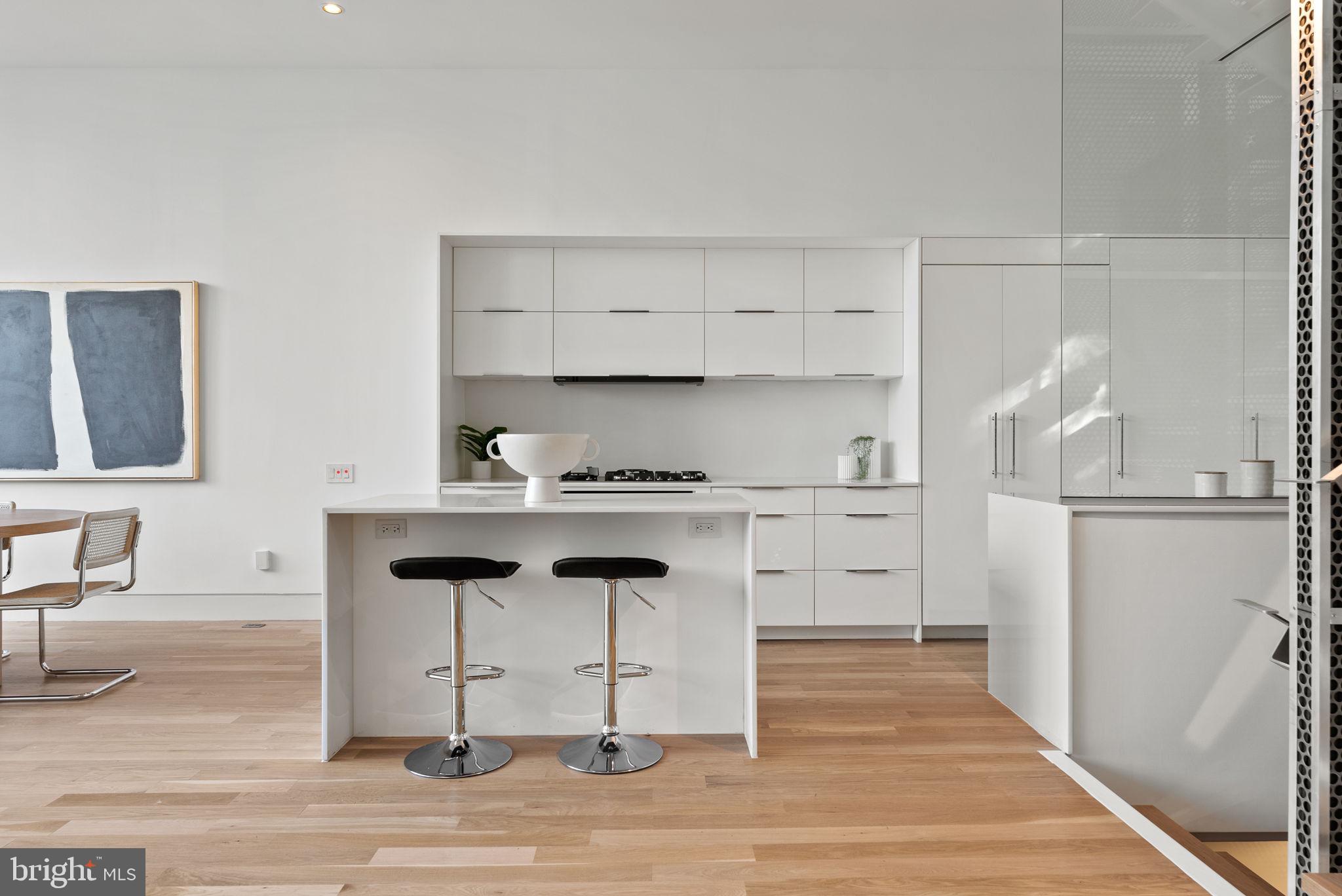 3623 R Street Northwest Washington, DC 20007 - Photo 7 of 87 a kitchen with white cabinets and sink