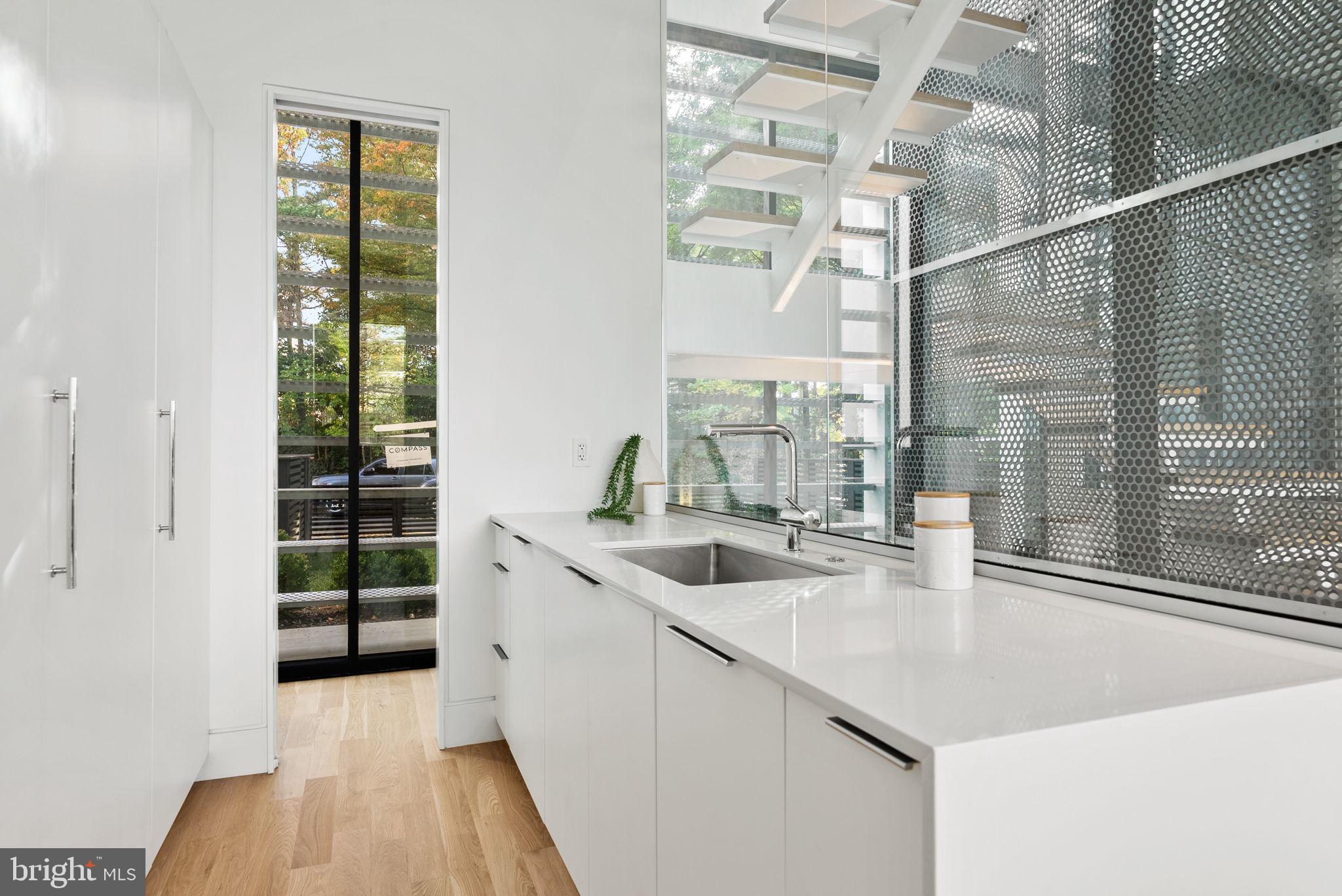 3623 R Street Northwest Washington, DC 20007 - Photo 9 of 87 a kitchen with a sink and a window