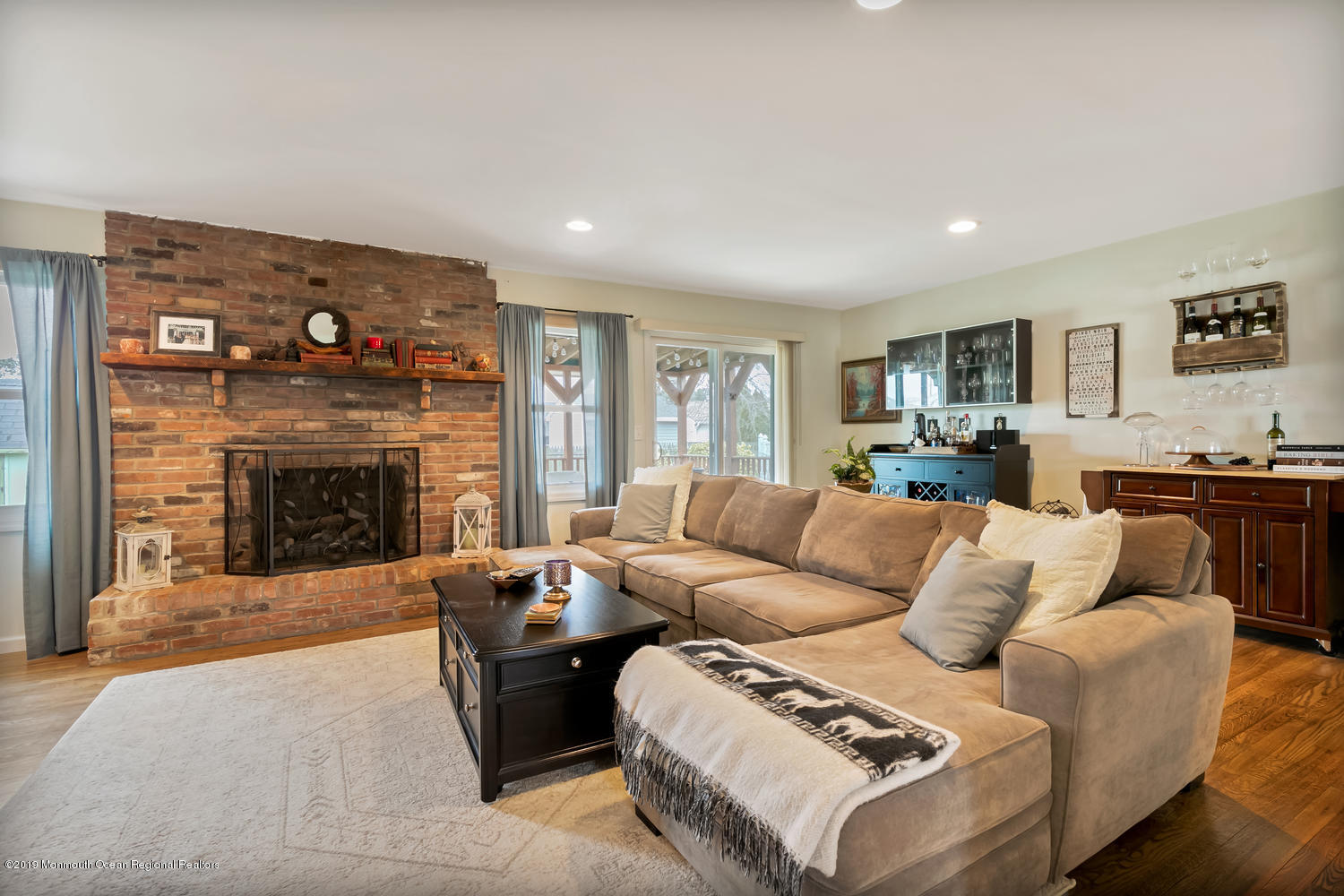 186 Binnacle Road Brick, NJ 08723 - Photo 6 of 25 a living room with furniture and a fireplace