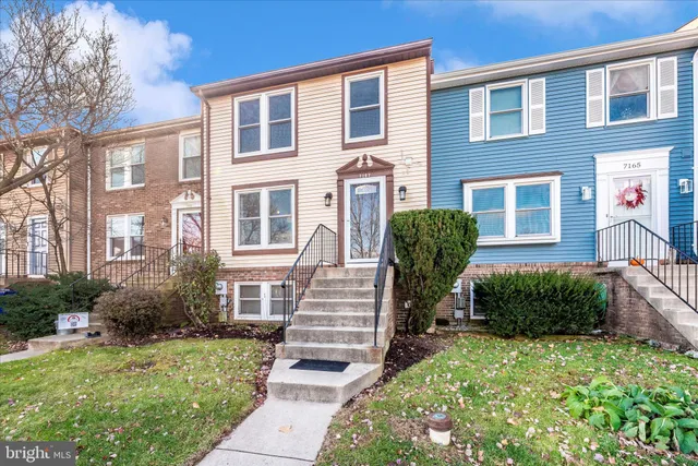a front view of a house having yard