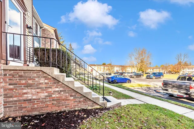 a view of a swimming pool with a terrace