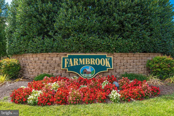 a street sign that is sitting in the grass