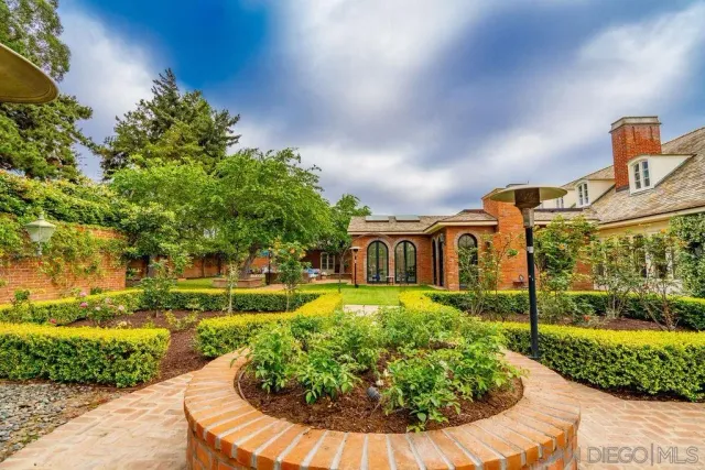 a view of hall way with furniture