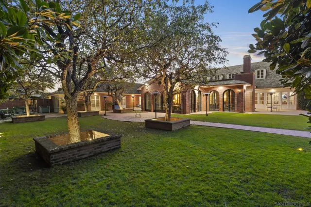 a view of a porch with wooden floor and windows
