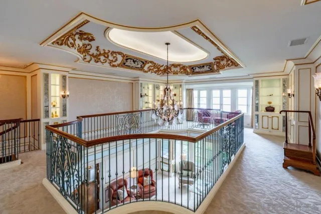 a kitchen with stainless steel appliances kitchen island granite countertop a stove a sink and a refrigerator