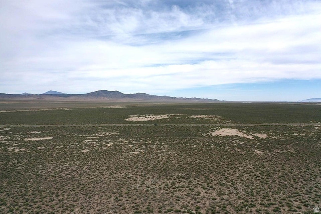 4000 Thermal Road Milford, UT 84751 - Photo 1 of 4 Expansive desert landscape featuring natural vegetation and distant mountain ranges