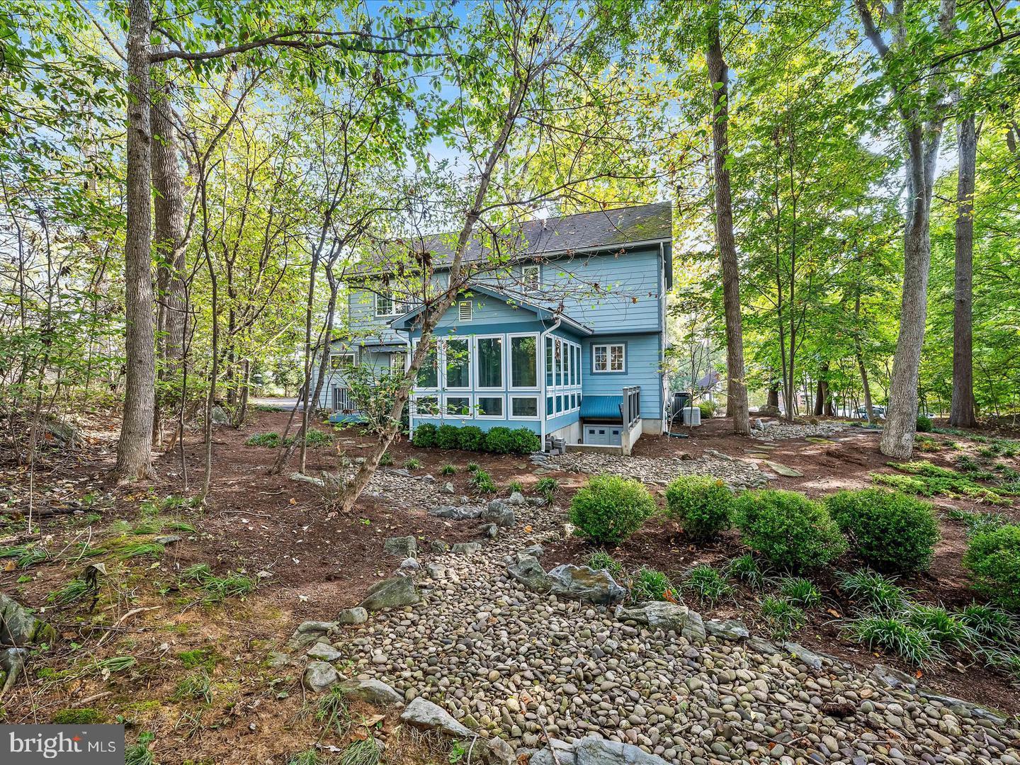 63 Hackberry Circle Shepherdstown, WV 25443 - Photo 3 of 55 Secluded porch addition-enjoy the passing seasons.