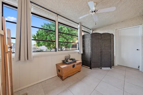 a view of entryway with furniture and a window
