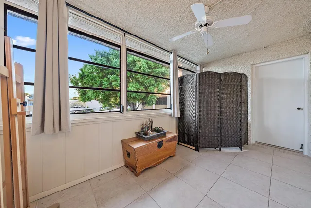a view of entryway with furniture and a window