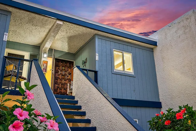 a entryway with flower pots