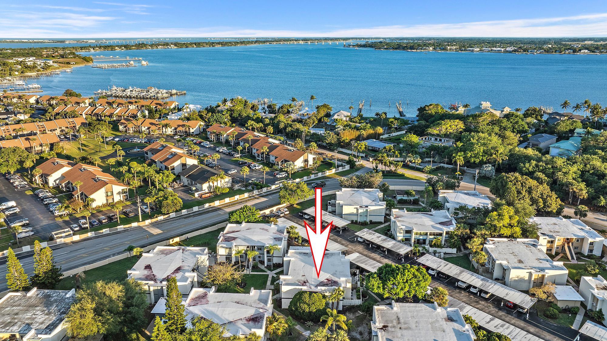 1561 Northeast 12th Terrace, Unit C14 Jensen Beach, FL 34957 - Photo 27 of 38 a view of a city and ocean view