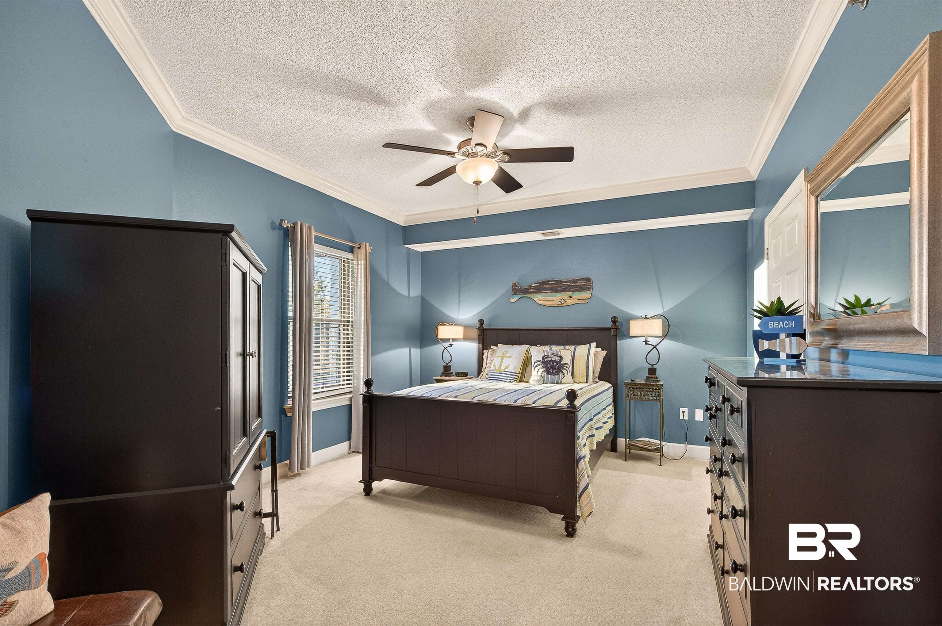 27582 Canal Road, Unit 2507 Orange Beach, AL 36561 - Photo 43 of 75 Carpeted bedroom with a textured ceiling, crown molding, and ceiling fan