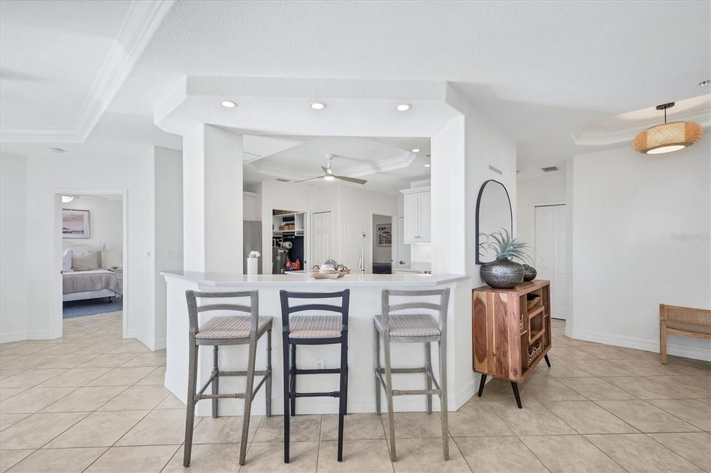 2770 North Beach Road, Unit 303 Englewood, FL 34223 - Photo 12 of 47 a dining room with furniture