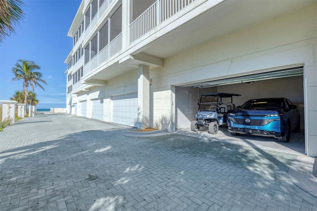 2770 North Beach Road, Unit 303 Englewood, FL 34223 - Photo 2 of 47 a view of a car parking garage