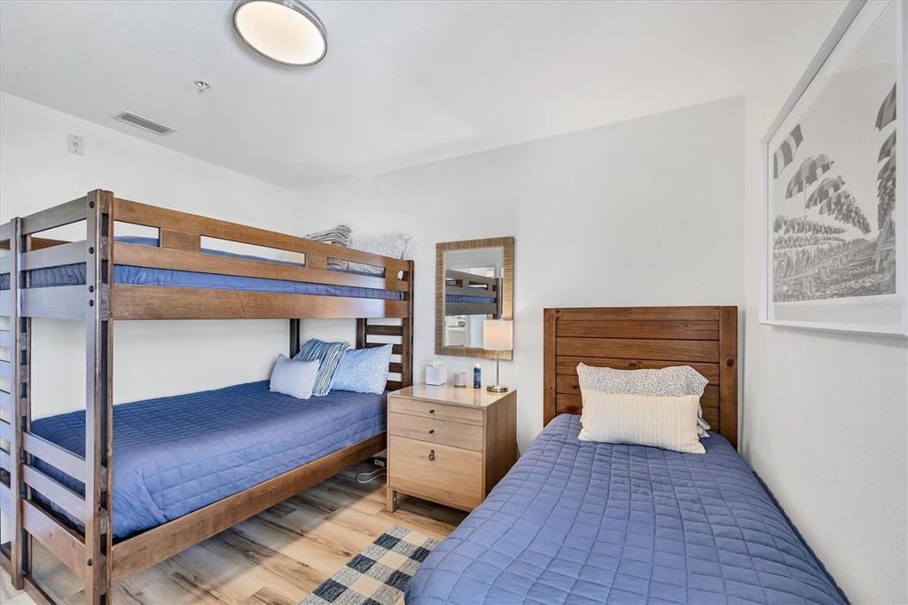 2770 North Beach Road, Unit 303 Englewood, FL 34223 - Photo 24 of 47 a living room with furniture and a rug