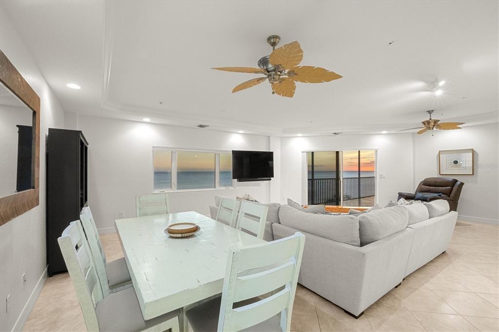 2770 North Beach Road, Unit 303 Englewood, FL 34223 - Photo 3 of 47 a living room with furniture kitchen view and a large window
