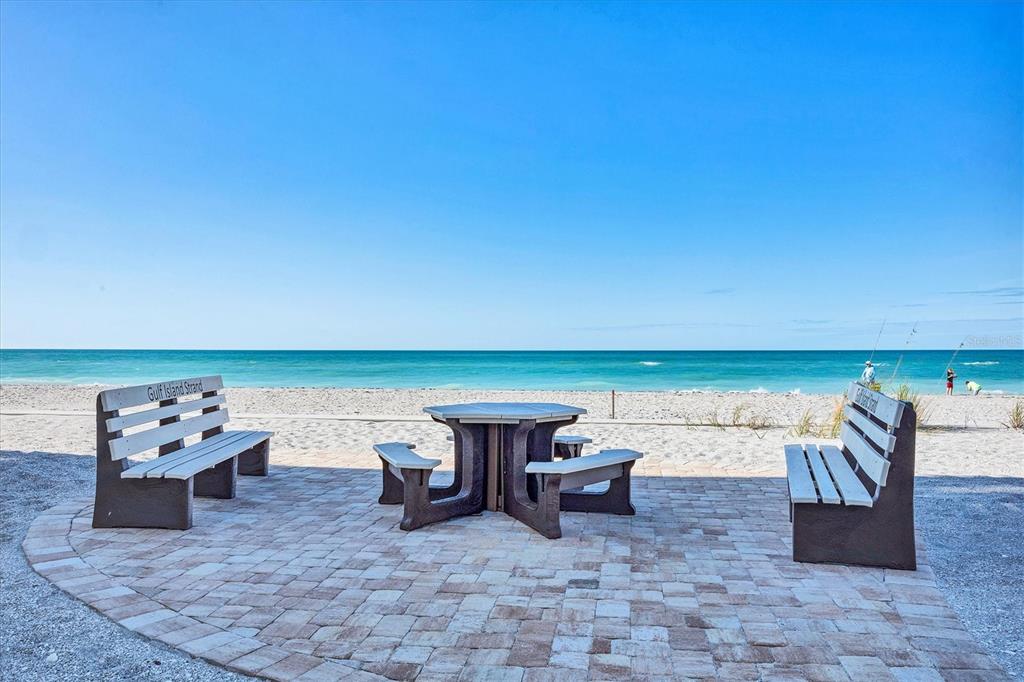 2770 North Beach Road, Unit 303 Englewood, FL 34223 - Photo 31 of 47 a view of a terrace with chairs and a table