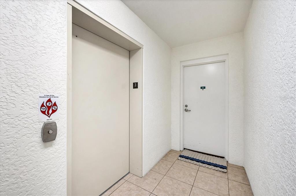 2770 North Beach Road, Unit 303 Englewood, FL 34223 - Photo 32 of 47 a view of an empty room