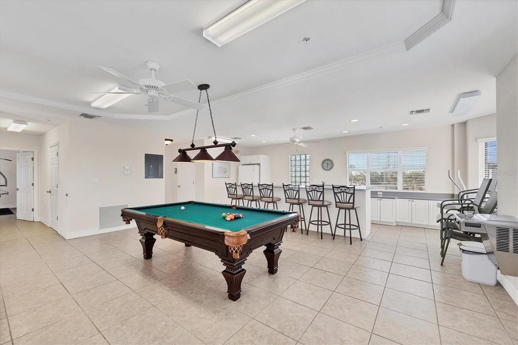 2770 North Beach Road, Unit 303 Englewood, FL 34223 - Photo 34 of 47 a room with furniture and pool table