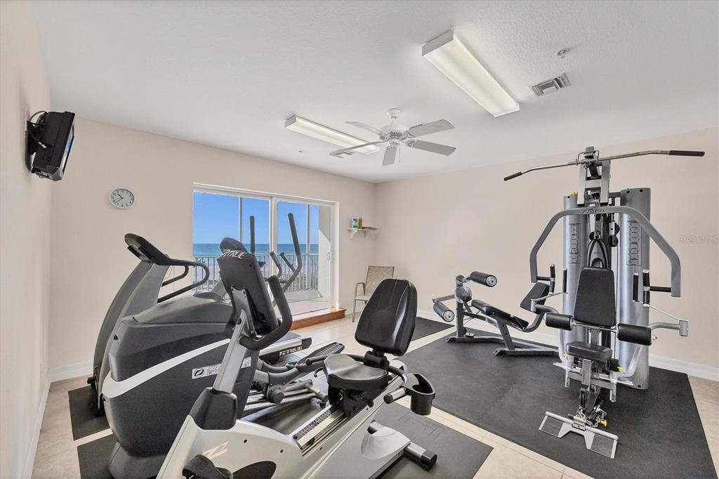 2770 North Beach Road, Unit 303 Englewood, FL 34223 - Photo 37 of 47 a view of a room with gym equipment