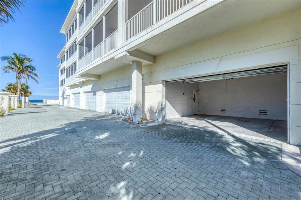 2770 North Beach Road, Unit 303 Englewood, FL 34223 - Photo 40 of 47 a view of a building with a street