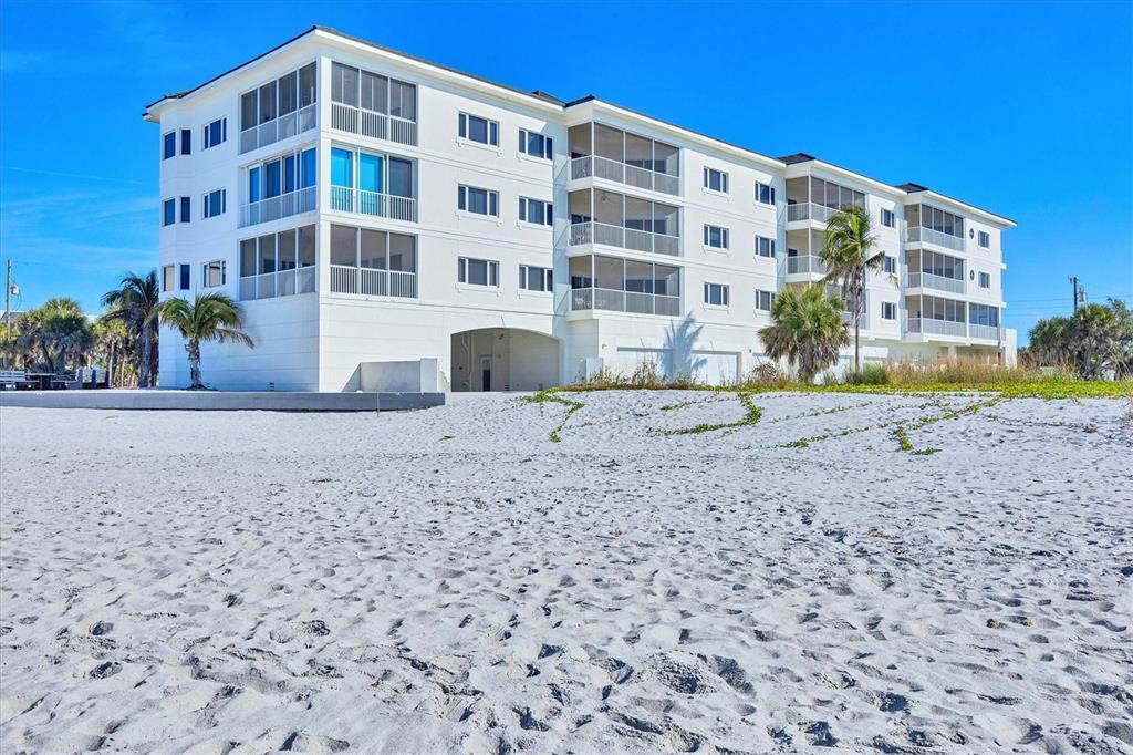 2770 North Beach Road, Unit 303 Englewood, FL 34223 - Photo 41 of 47 a front view of a building