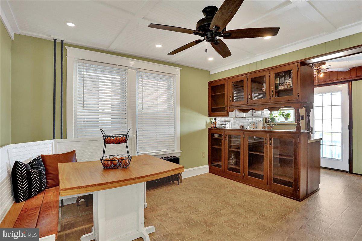 325 2nd Street Reading, PA 19607 - Photo 11 of 38 a living room with stainless steel appliances kitchen island granite countertop furniture and a large window