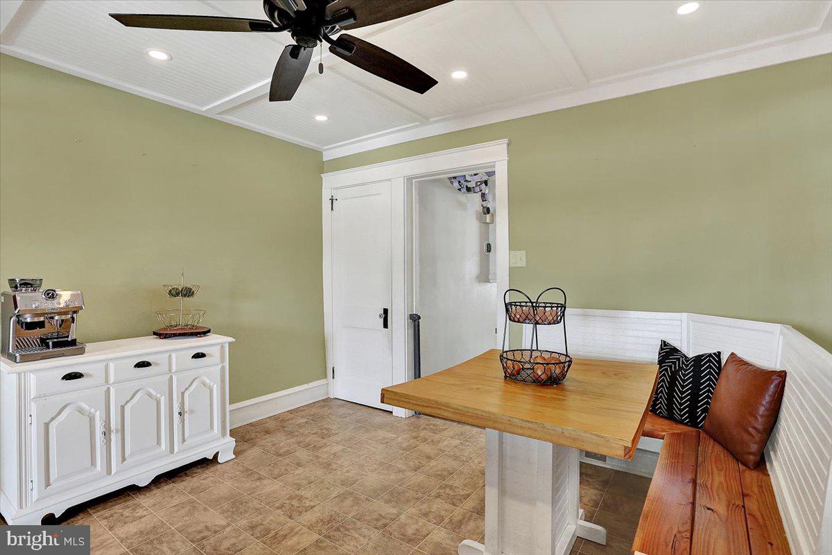 325 2nd Street Reading, PA 19607 - Photo 13 of 38 a bedroom with a bed and a chandelier