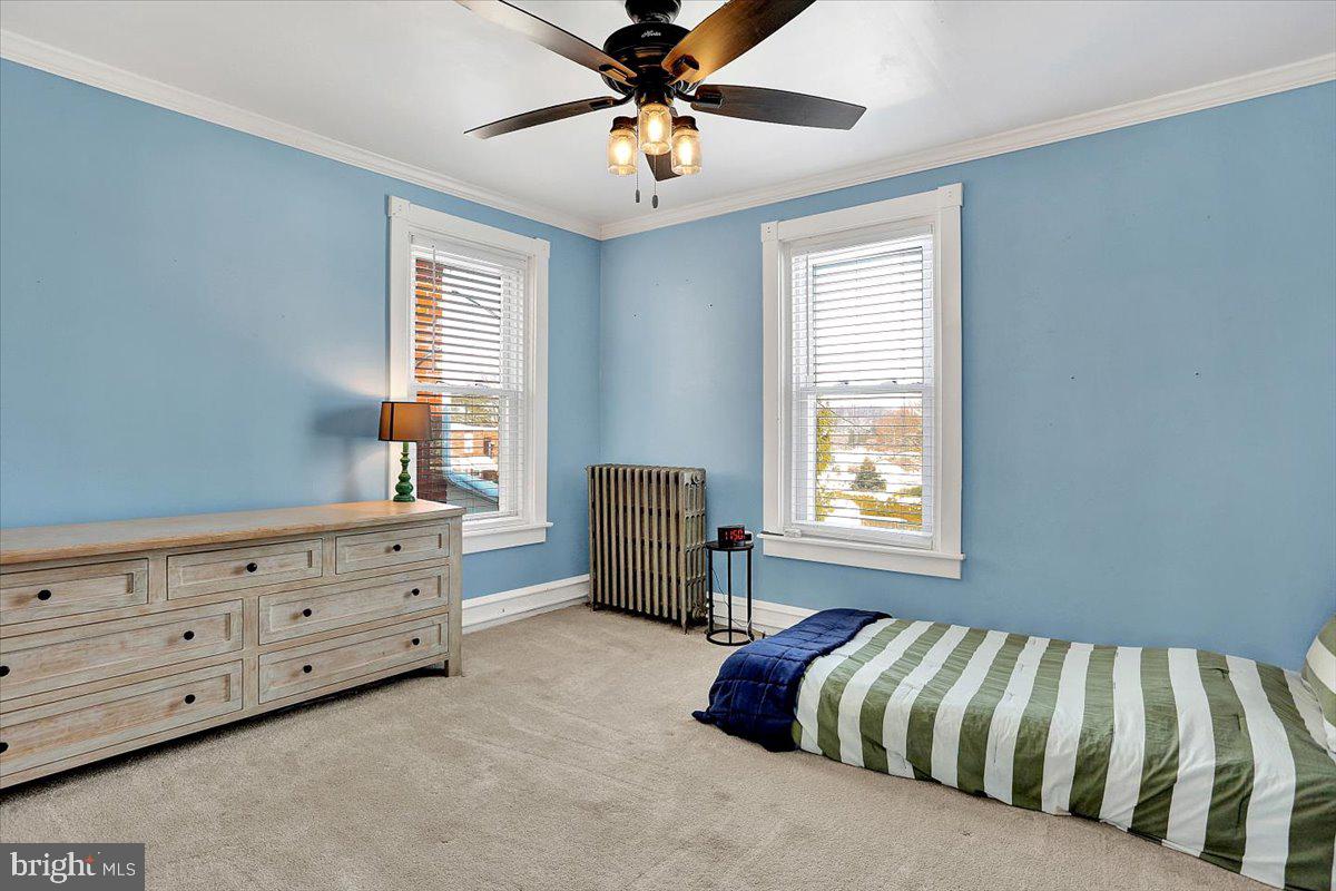 325 2nd Street Reading, PA 19607 - Photo 22 of 38 a bedroom with furniture and windows