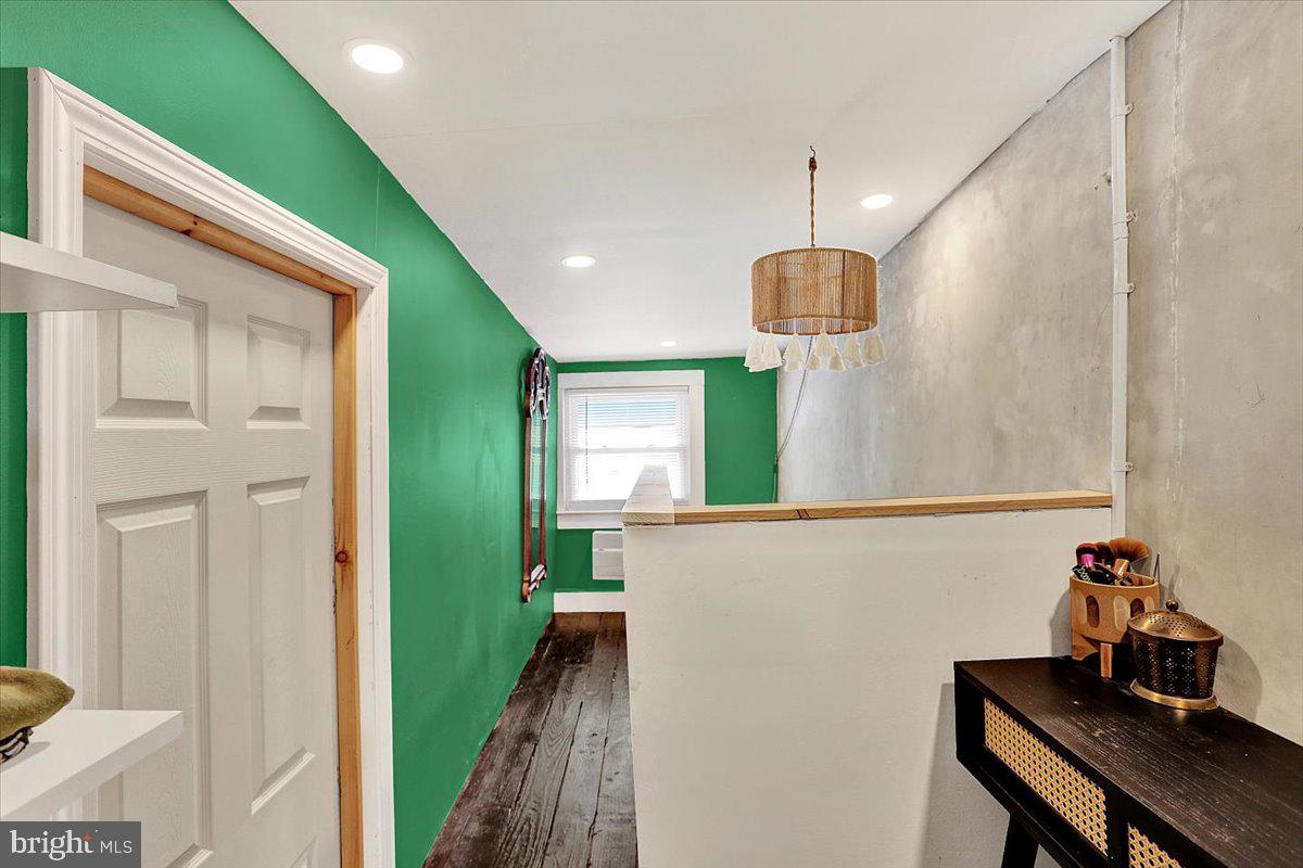 325 2nd Street Reading, PA 19607 - Photo 30 of 38 a hallway with a table and chairs