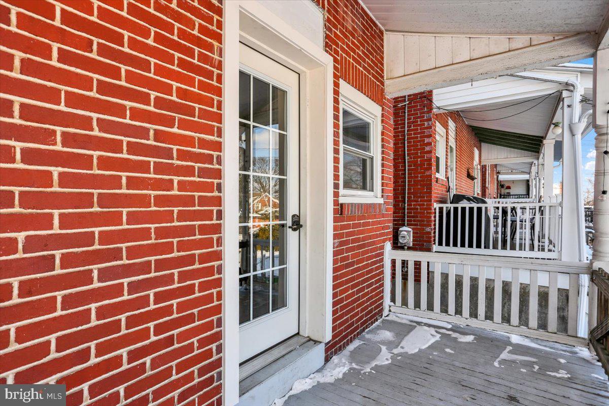 325 2nd Street Reading, PA 19607 - Photo 34 of 38 a view of a brick house with a window