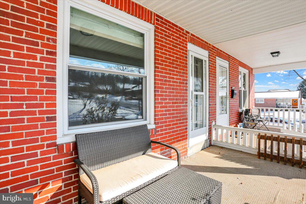 325 2nd Street Reading, PA 19607 - Photo 5 of 38 a living room with furniture and a window