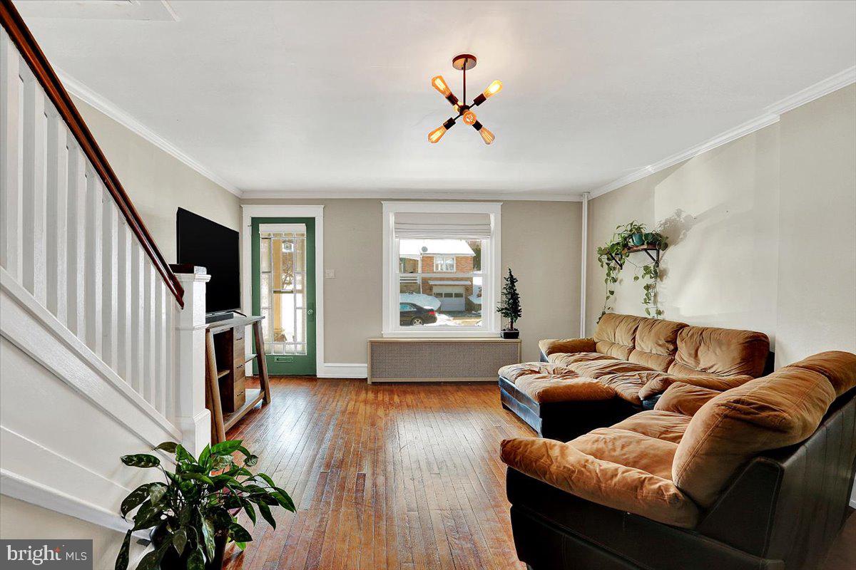 325 2nd Street Reading, PA 19607 - Photo 7 of 38 a living room with furniture and a large window