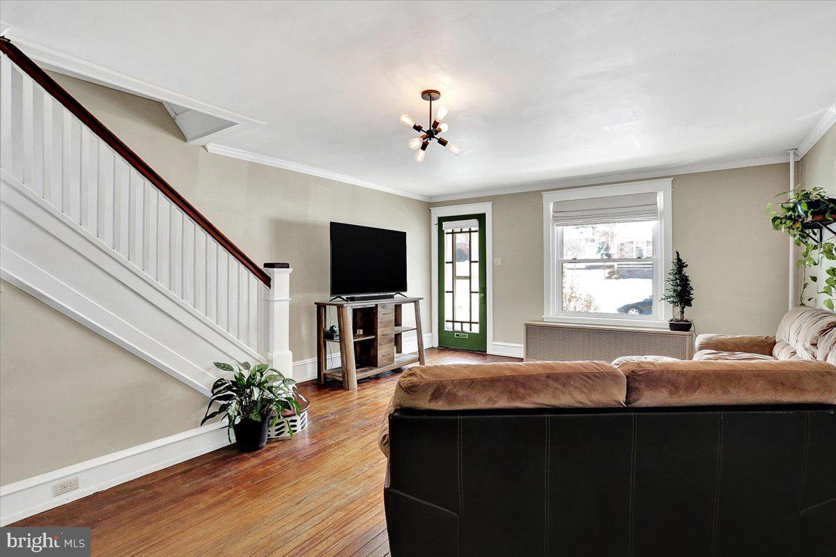 325 2nd Street Reading, PA 19607 - Photo 8 of 38 a living room with furniture and a flat screen tv