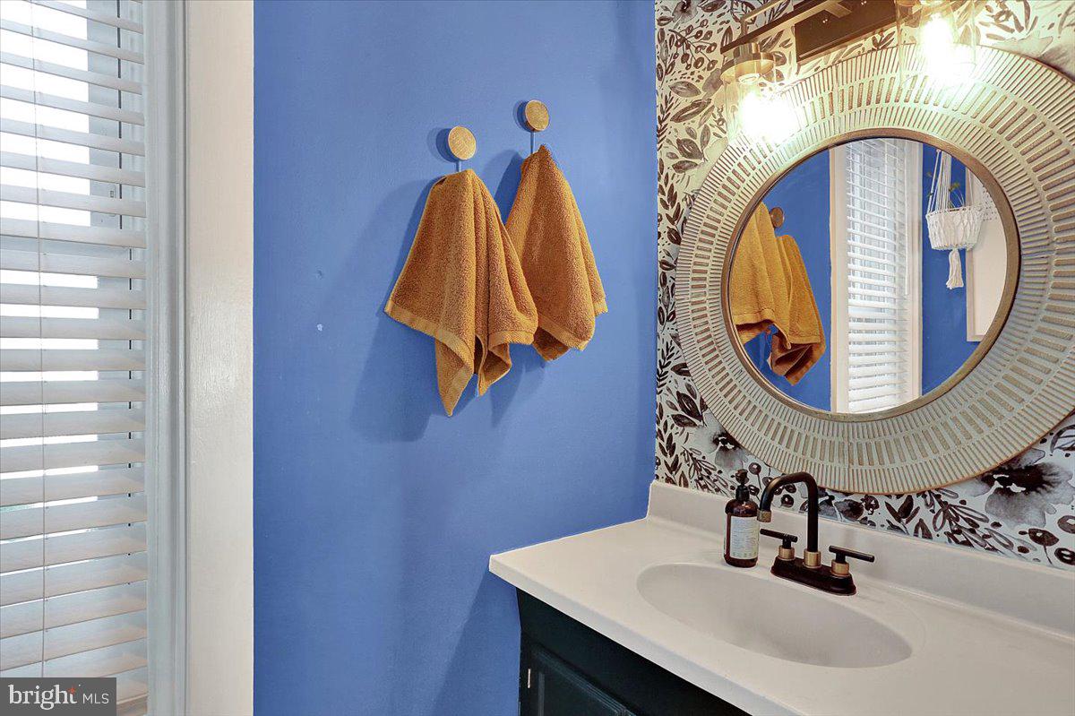 325 2nd Street Reading, PA 19607 - Photo 9 of 38 a bathroom with a sink and a mirror