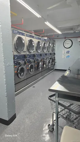 a backyard of a house with outdoor seating