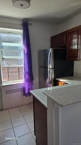 a kitchen with a stove and a microwave