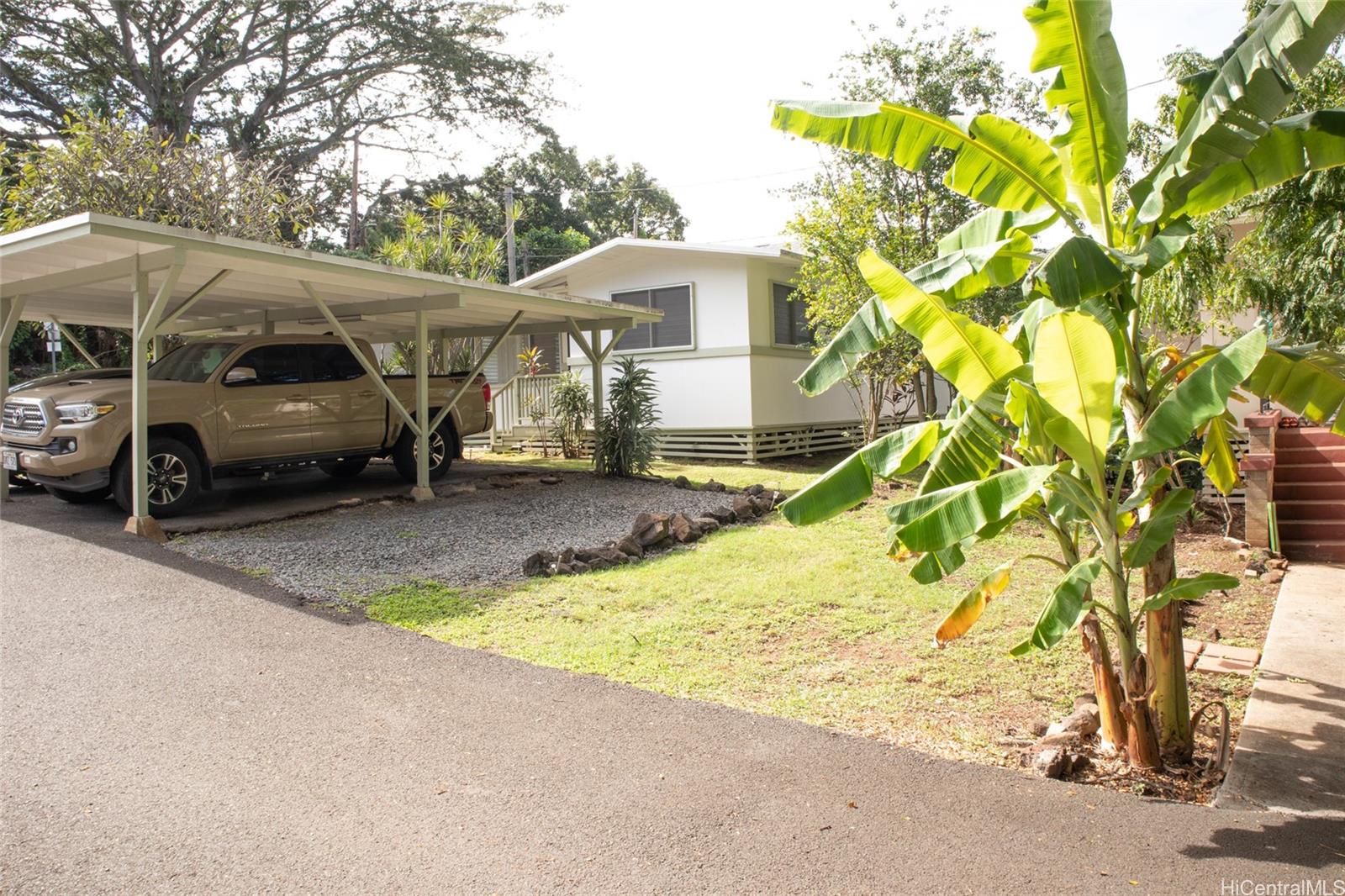 2024 Ohai Lane, Unit D Honolulu, HI 96813 - Photo 3 of 11 a view of a car parked in front of a house