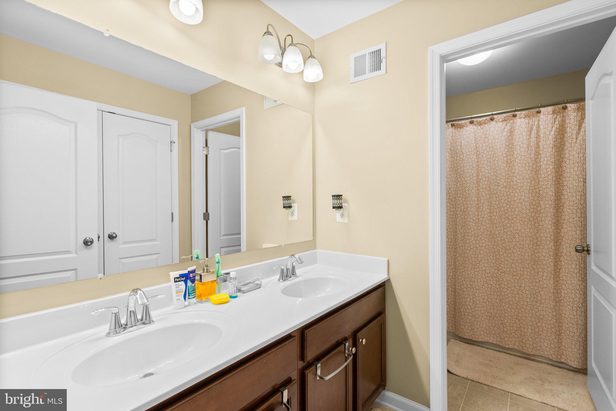 17510 Madrillon Way Accokeek, MD 20607 - Photo 12 of 40 Upper level Bath w/ dual sinks