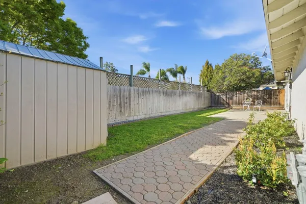 a view of a backyard with a garden