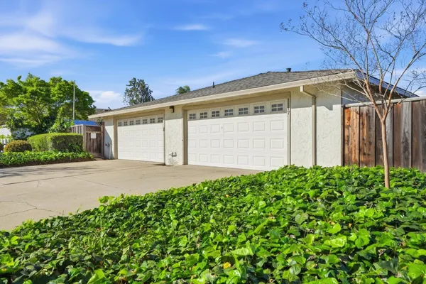 a front view of a house with a garage