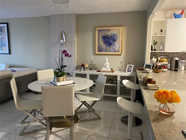 a view of balcony with furniture