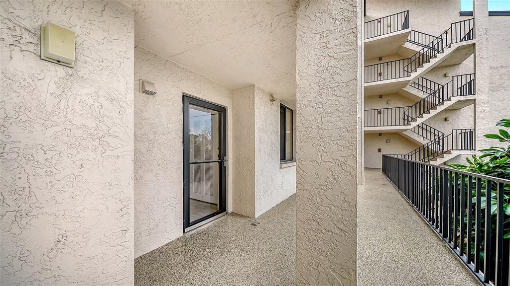 6287 Midnight Pass Road, Unit 103 Sarasota, FL 34242 - Photo 3 of 36 a view of walk in closet