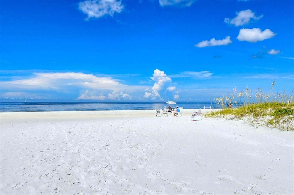 6287 Midnight Pass Road, Unit 103 Sarasota, FL 34242 - Photo 36 of 36 a view of an ocean and beach
