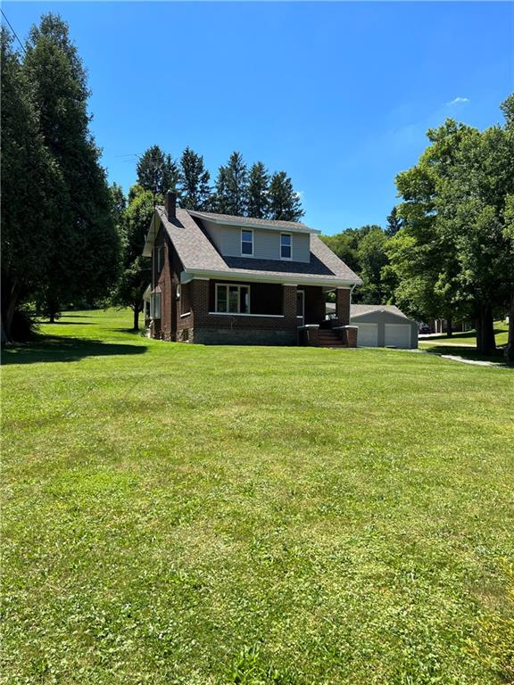 104 Bish Road Butler, PA 16002 - Photo 1 of 20 a front view of a house with a yard
