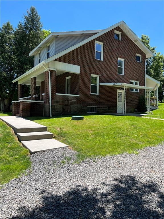 104 Bish Road Butler, PA 16002 - Photo 2 of 20 a front view of house with yard and green space