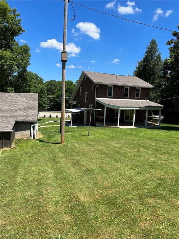 104 Bish Road Butler, PA 16002 - Photo 3 of 20 a front view of a house with a yard