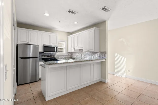 $1,400 | 212 Bonita Circle, Unit A, Panama City Beach, FL 32408