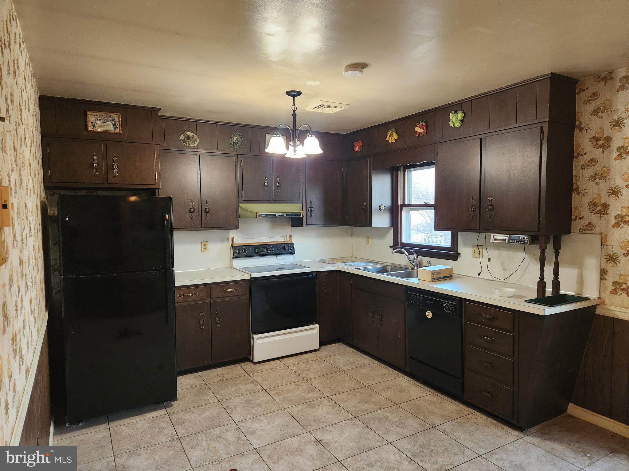 3734 Elizabethtown Road Manheim, PA 17545 - Photo 11 of 34 a kitchen with a sink cabinets and stainless steel appliances