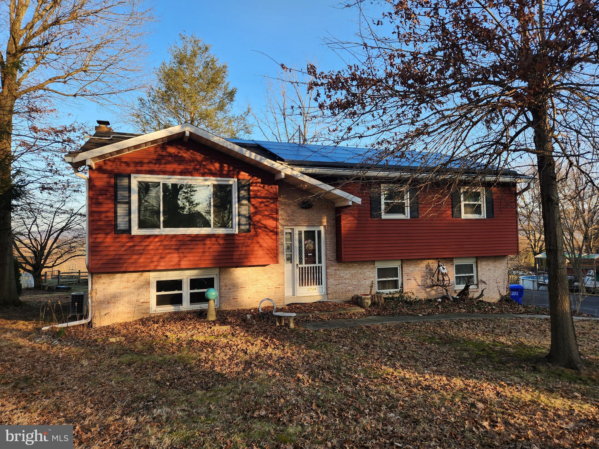 3734 Elizabethtown Road Manheim, PA 17545 - Photo 2 of 34 a front view of a house with a yard
